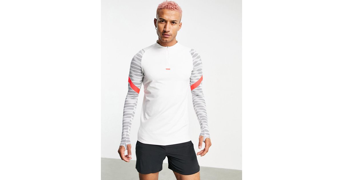 white nike strike drill top