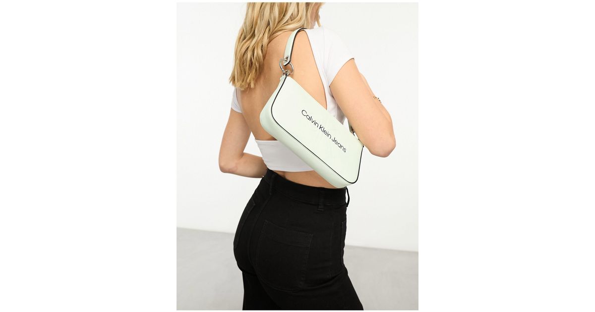 Calvin Klein Sculpted Shoulder Pouch Bag in White