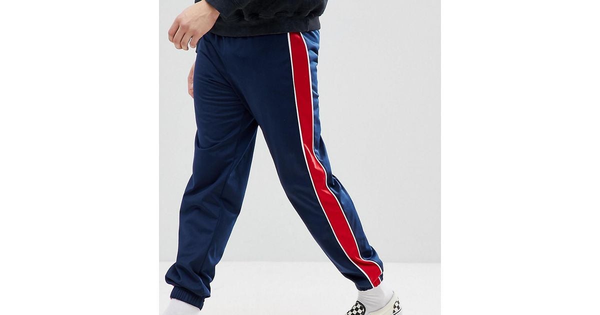 navy trousers with red stripe