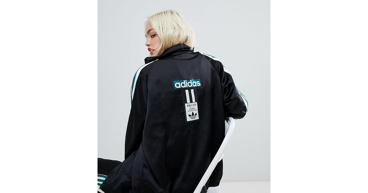 adidas original three stripe track jacket with vintage logo in black