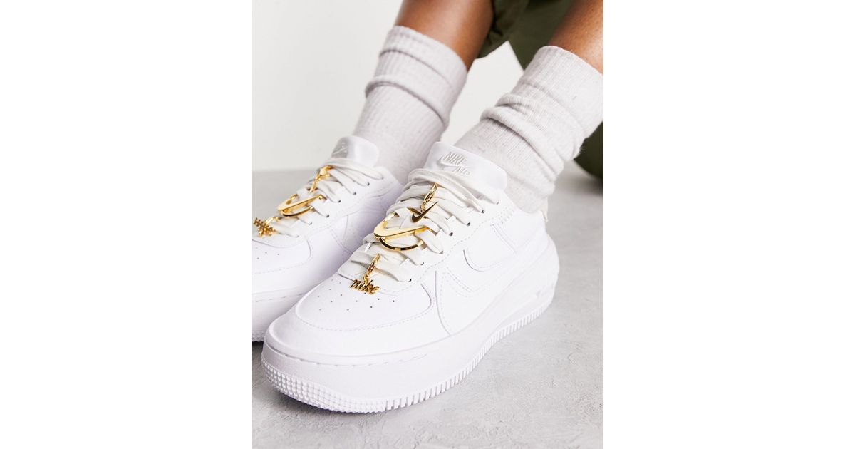 white air force gold tick