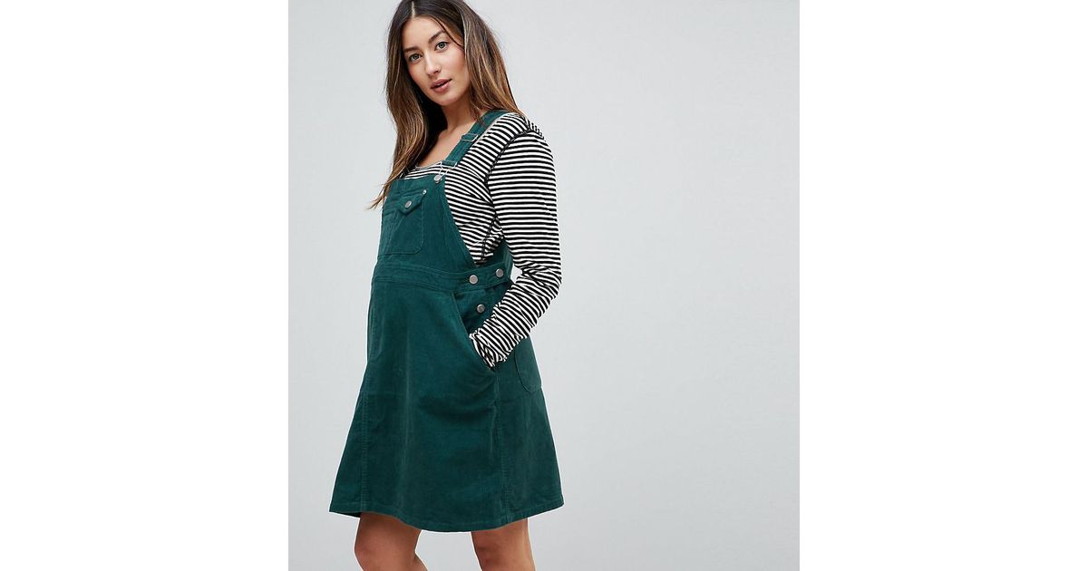 green cord dungaree dress