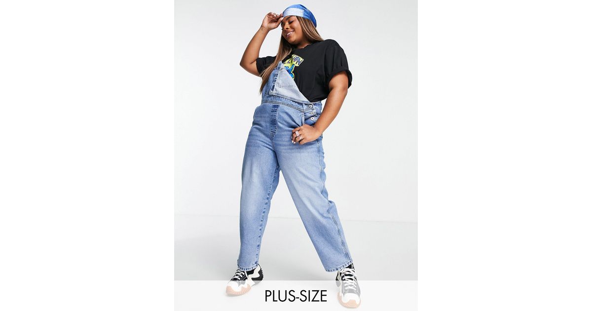 Collusion Plus 90s baggy Denim Dungarees in Blue Lyst UK