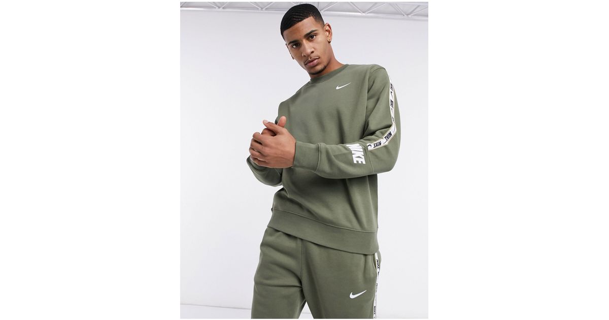 nike repeat pack logo taping crew neck sweat in grey