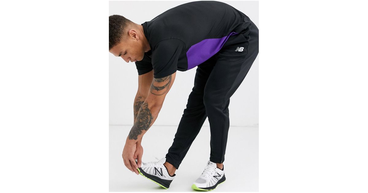 new balance running tenacity tapered joggers in black