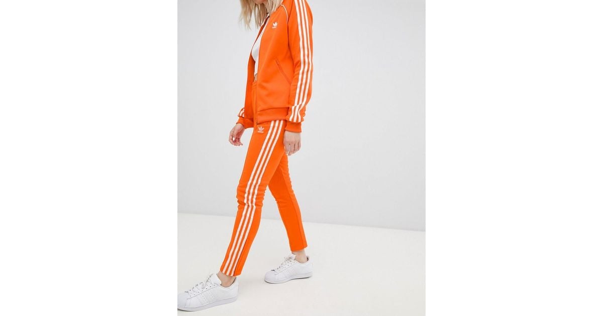 activering Maak een naam omroeper adidas Originals Rechte Broek Met Drie Strepen In Oranje in het Oranje |  Lyst NL