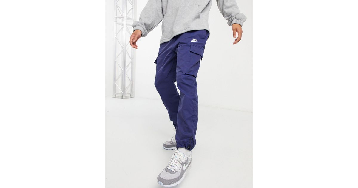 Nike Club Essentials Woven Cargo joggers in Blue for Men Lyst Canada