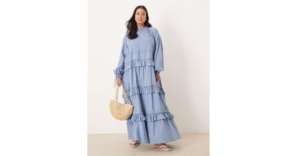 asos design tiered ruffle maxi dress ASOS DESIGN tiered ruffle long sleeve chiffon maxi dress in floral print