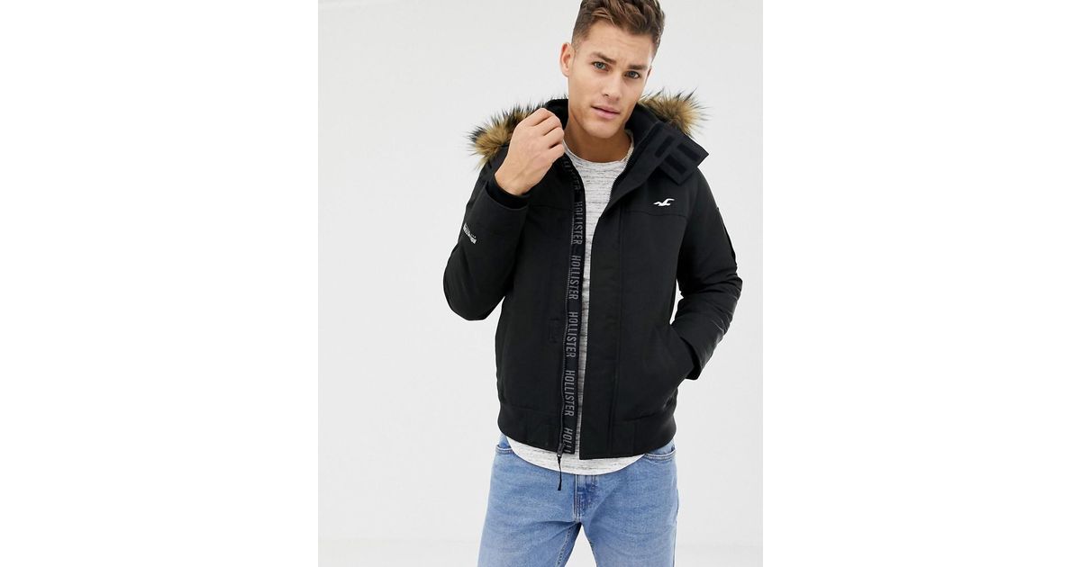 HOLLISTER NAVY FUR LINED BOMBER JACKET WITH HOODIE