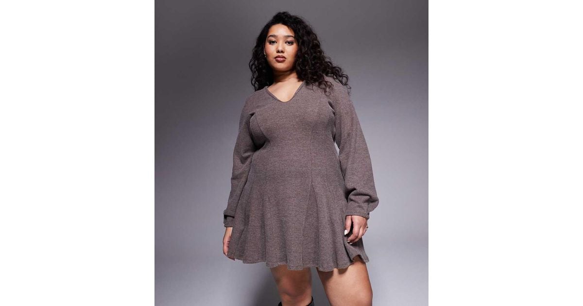 asos curve fit and flare dress ASOS DESIGN Curve tie back chunky cord flare hem midi dress in black