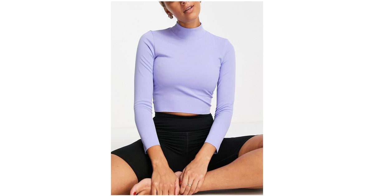 Nike Nike Yoga Luxe Dri-fit Cropped Long Sleeve Top in Purple