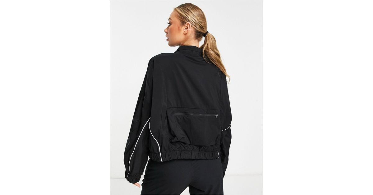 Nike Run Division Packable Jacket in Black Lyst UK