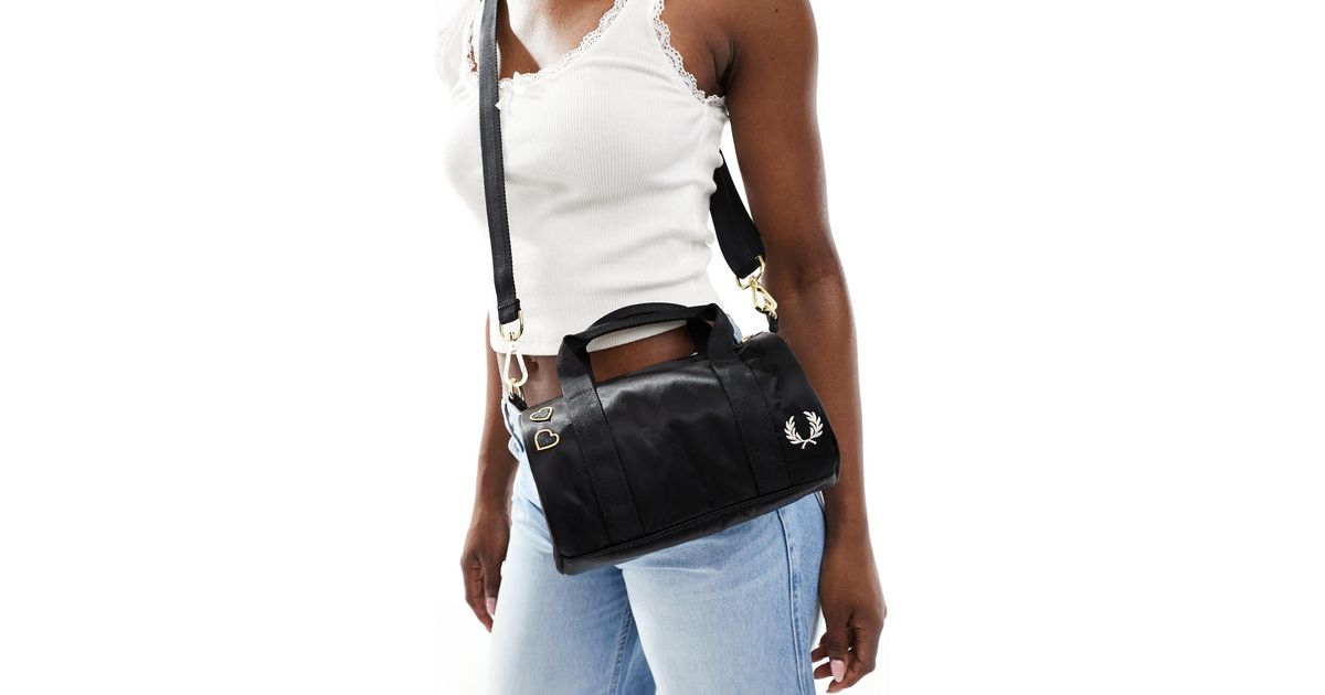 Fred Perry X Amy Winehouse Mini Satin Barrel Bag in Black | Lyst