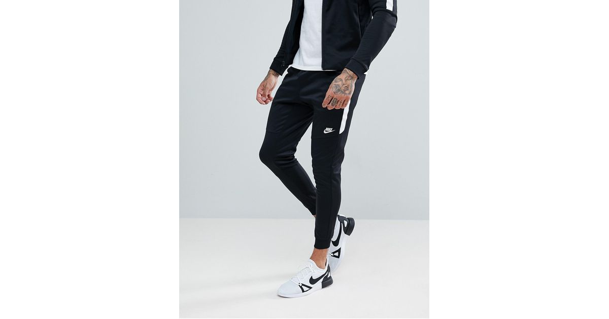 Nike tribute poly joggers in black online