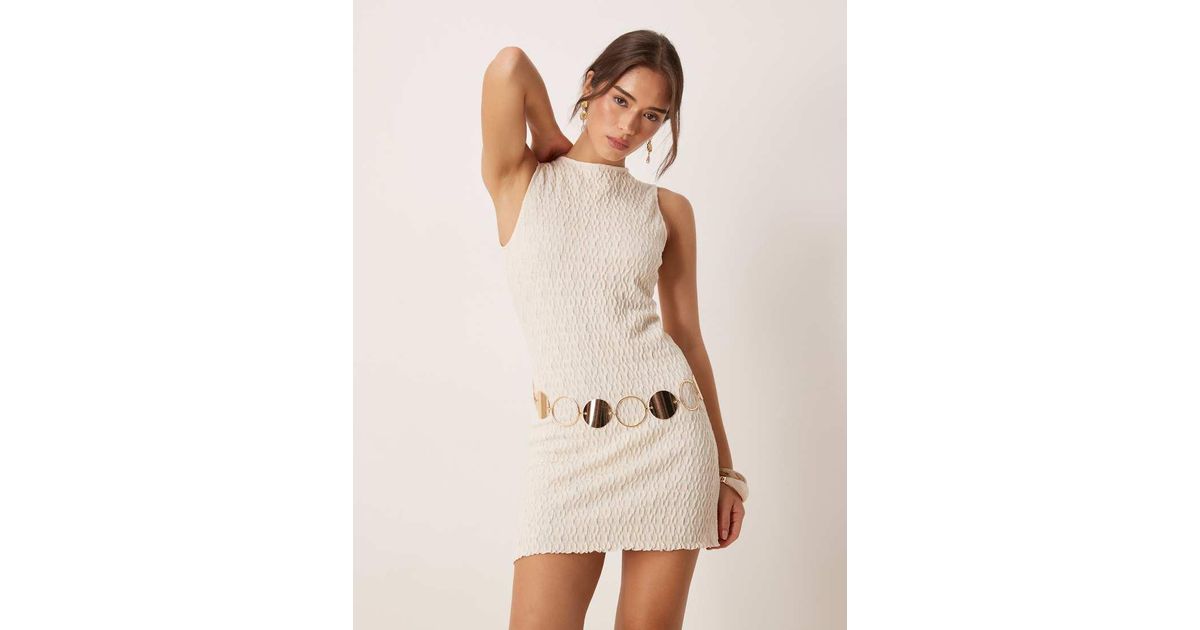 mango textured cotton blend dress Mango cotton mix textured round neck mini dress with lettuce hem in white