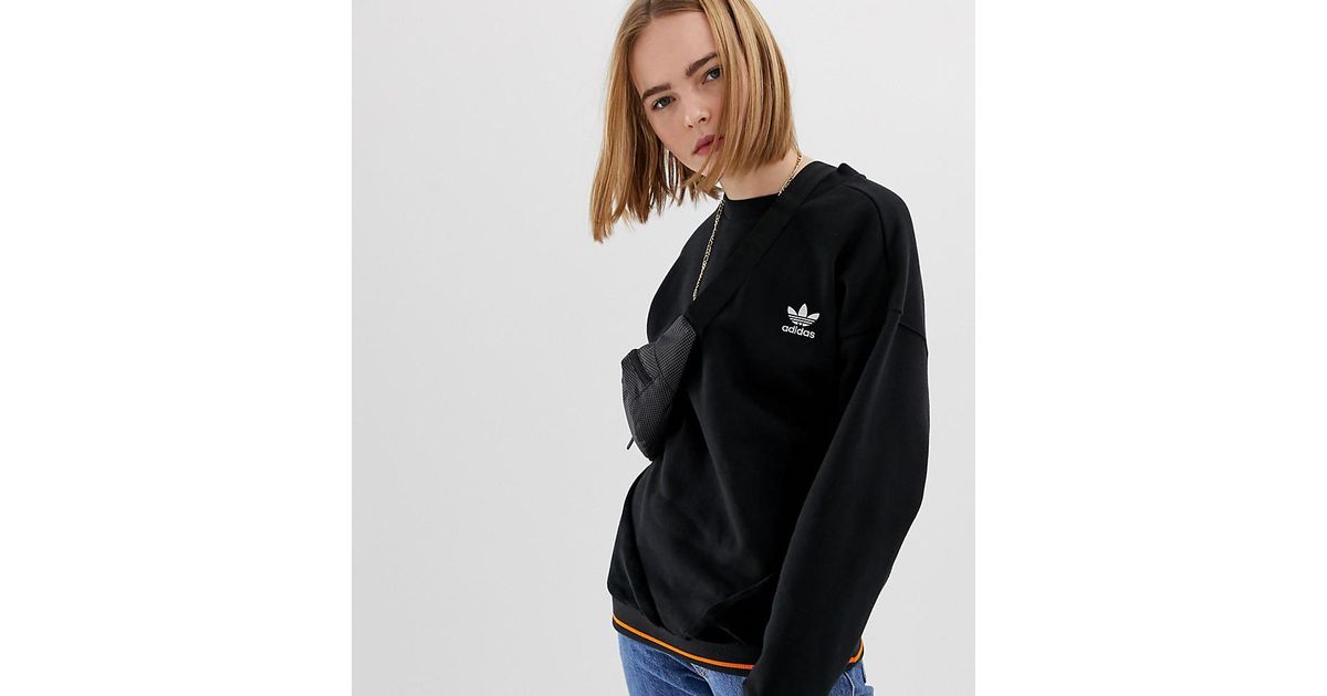 adidas originals sweatshirt in black with orange piping