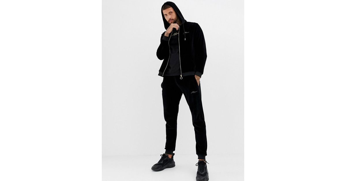 Tuta in velour nera con ricami oroBoohooMAN in Denim da Uomo colore Nero |  Lyst