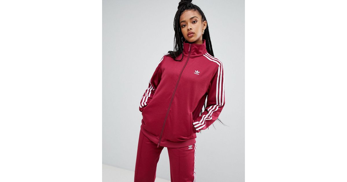 adidas originals adicolor three stripe track jacket in red