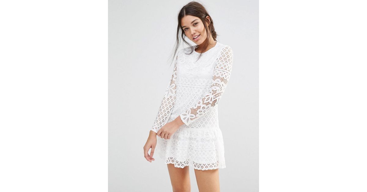white frill long sleeve dress