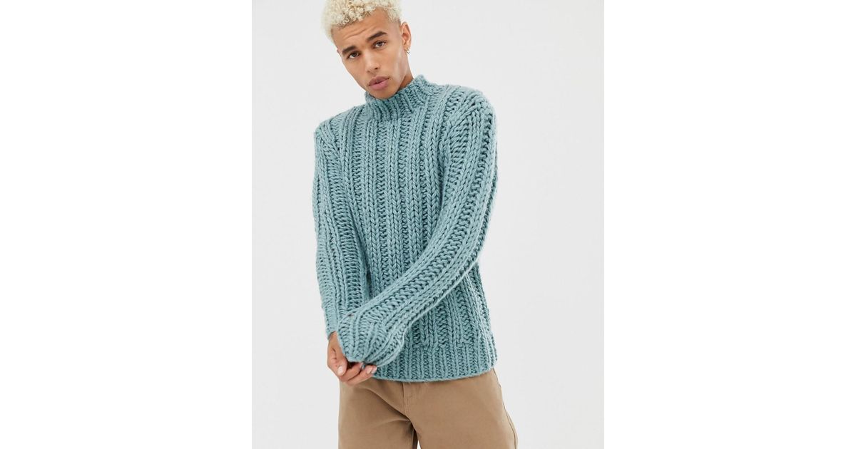 light blue turtleneck sweater