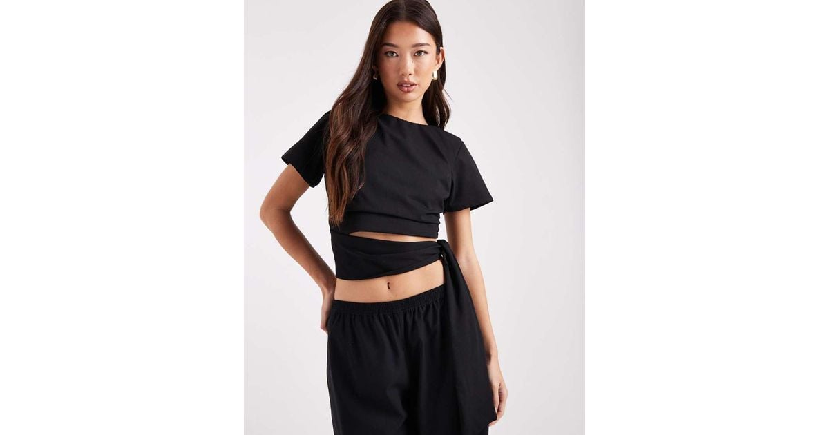 ASOS Crop T-shirt With Shoulder Pads And Tie Side Waist in Black