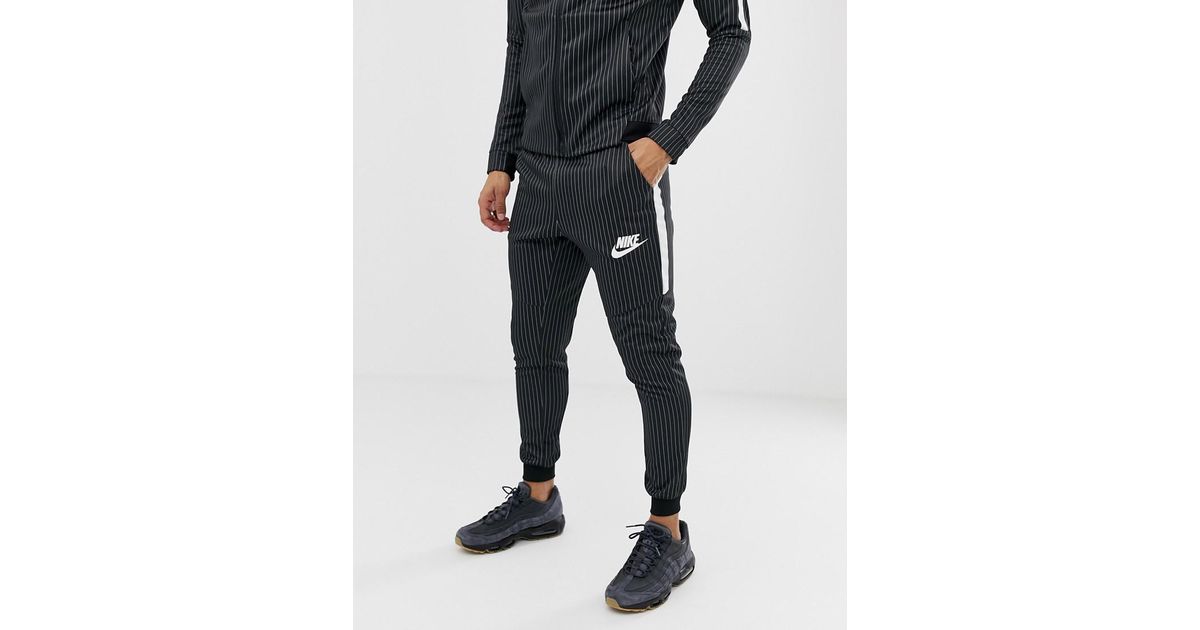 Pantalon de jogging fines rayures Nike pour homme en coloris Noir | Lyst