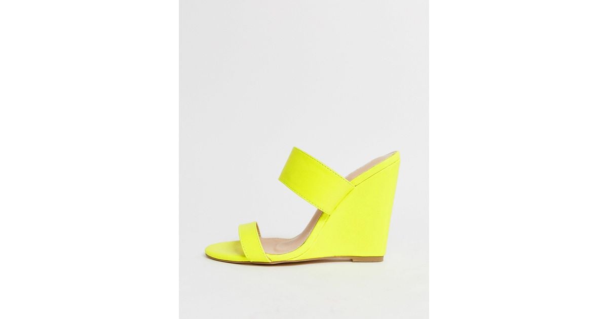 neon yellow wedge heels