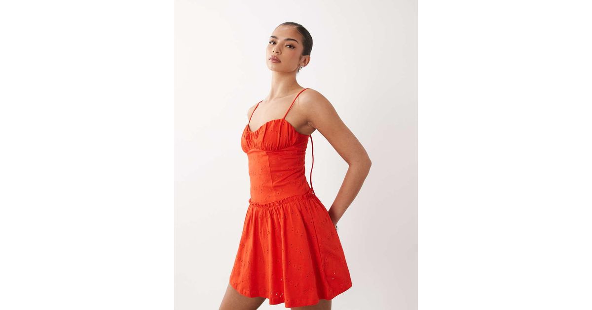 asos red broderie dress ASOS DESIGN broderie cami mini dress in red
