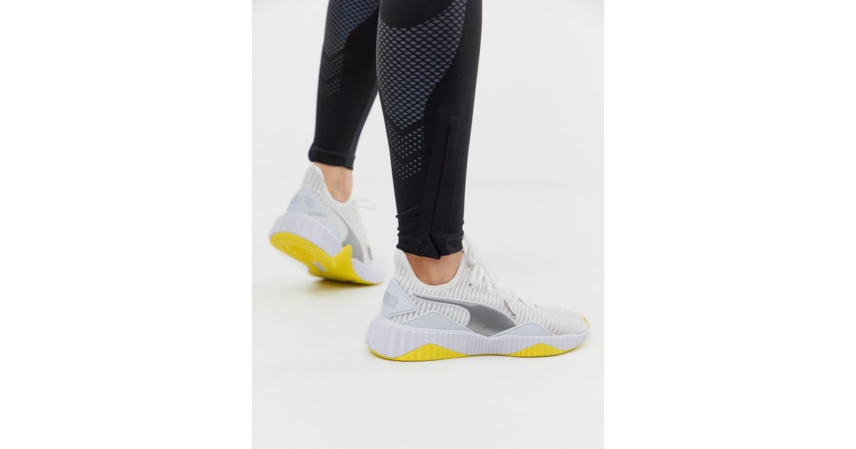 puma defy yellow