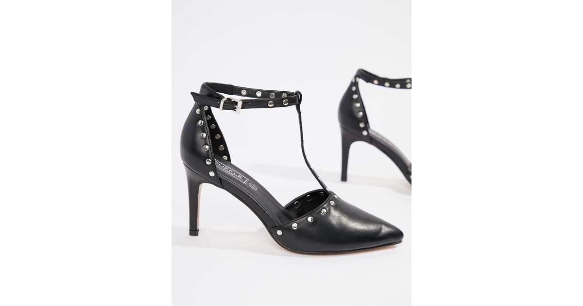 black studded pointed heels