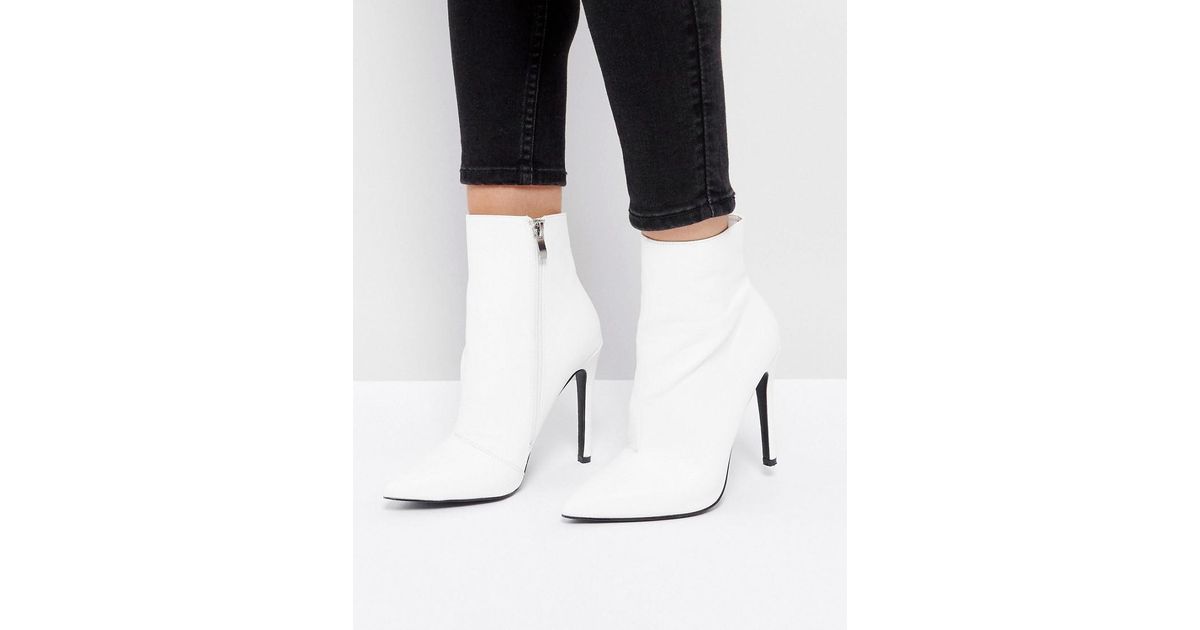 white pointed boots