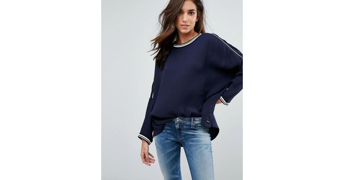 blue batwing top