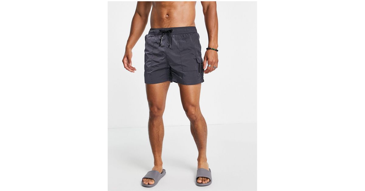 Pantaloncini da bagno con tasche cargo nero da Uomo di Bershka in Arancione  | Lyst