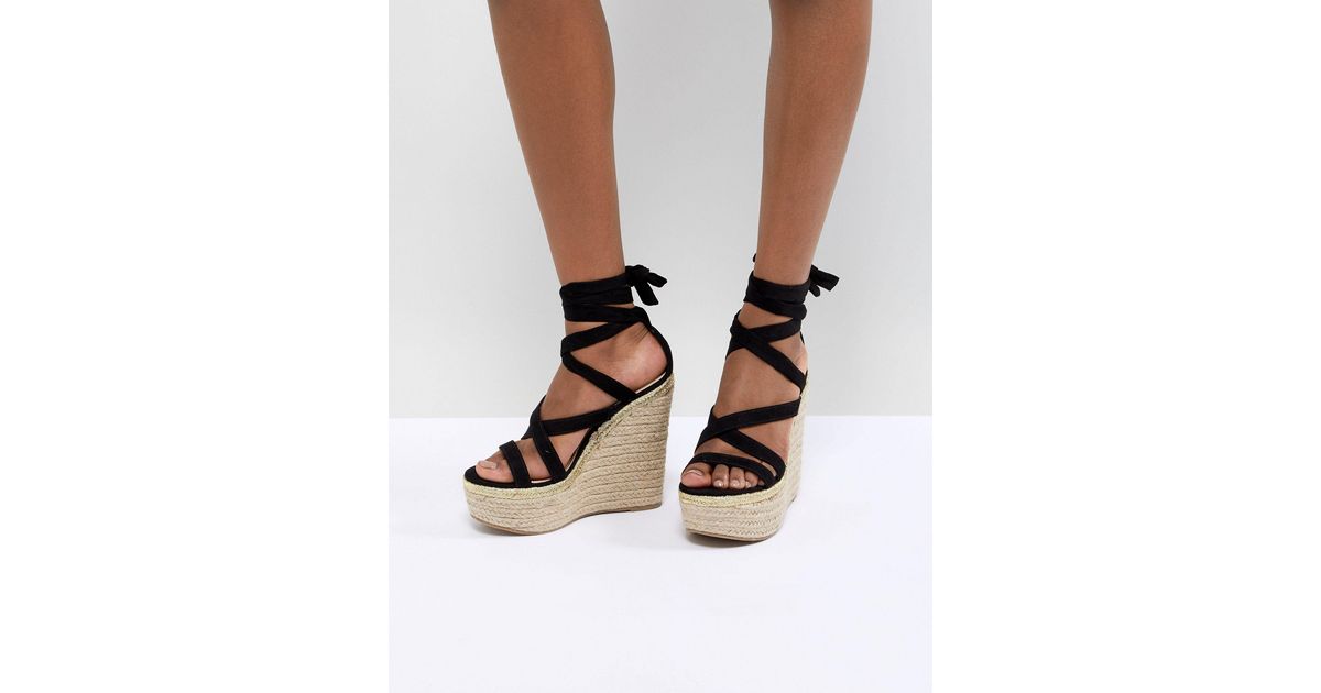 asos design trophy tie leg high wedges
