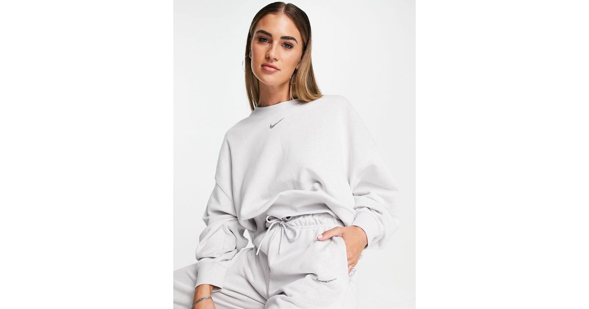 nike lounge essential fleece pants in grey marl