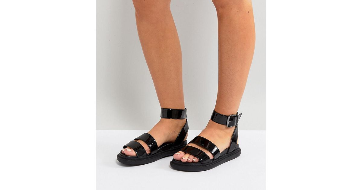 black flat chunky sandals