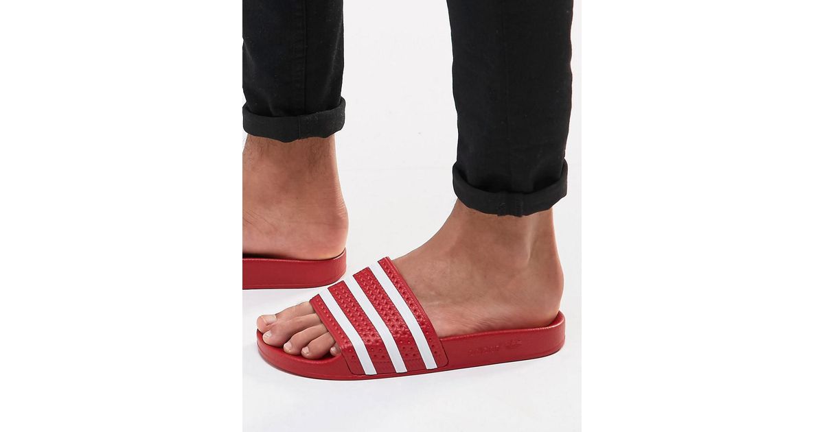 red adidas sliders