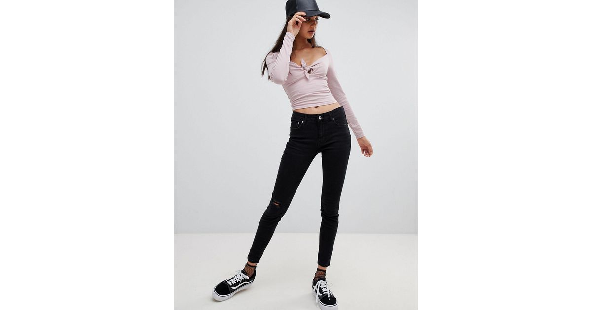 Jeans push-up skinny neri con strappiBershka in Denim di colore Nero | Lyst