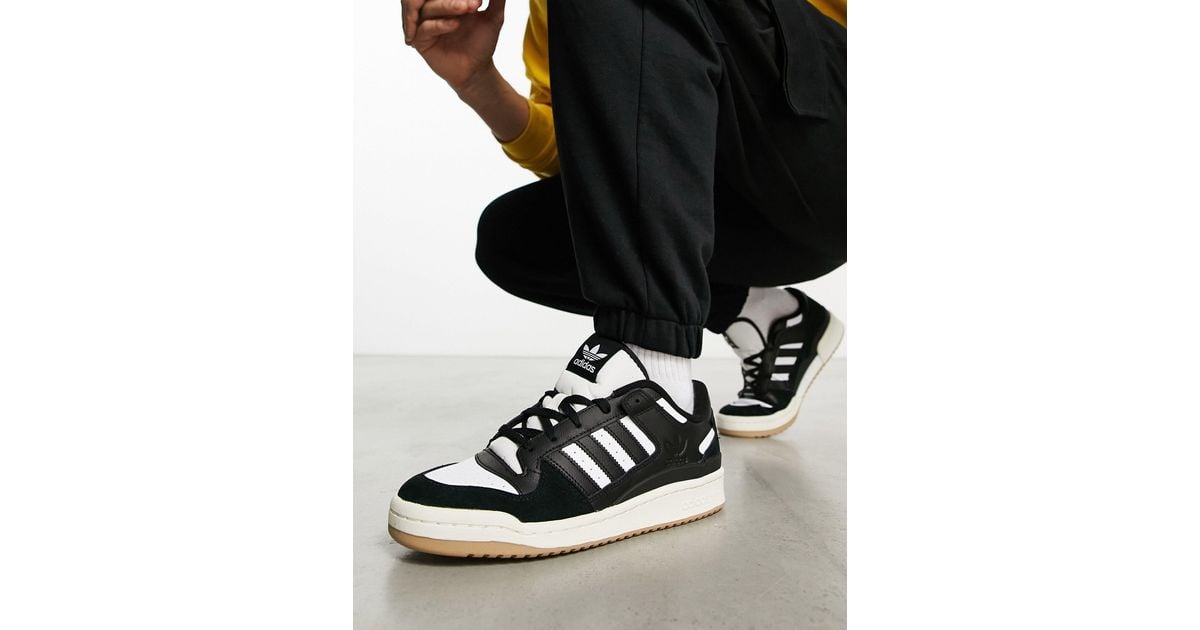 adidas originals forum 84 low gum sole sneakers in black