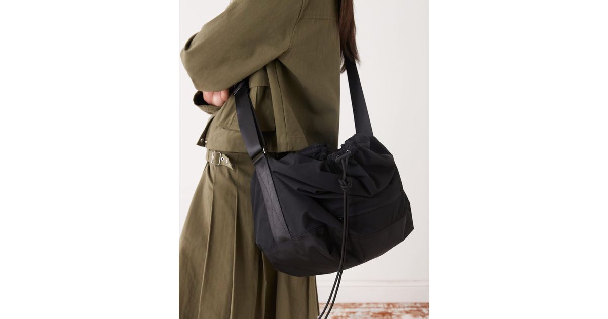 Weekday Nylon Cross Body Drawstring Bag in Black | Lyst