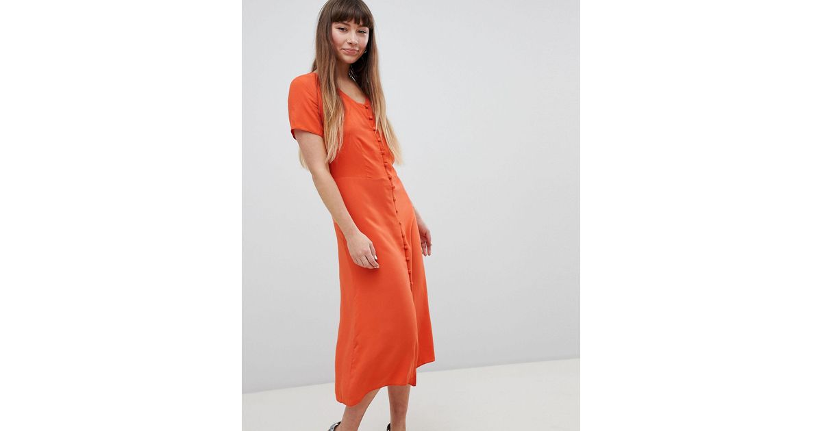 orange button dress