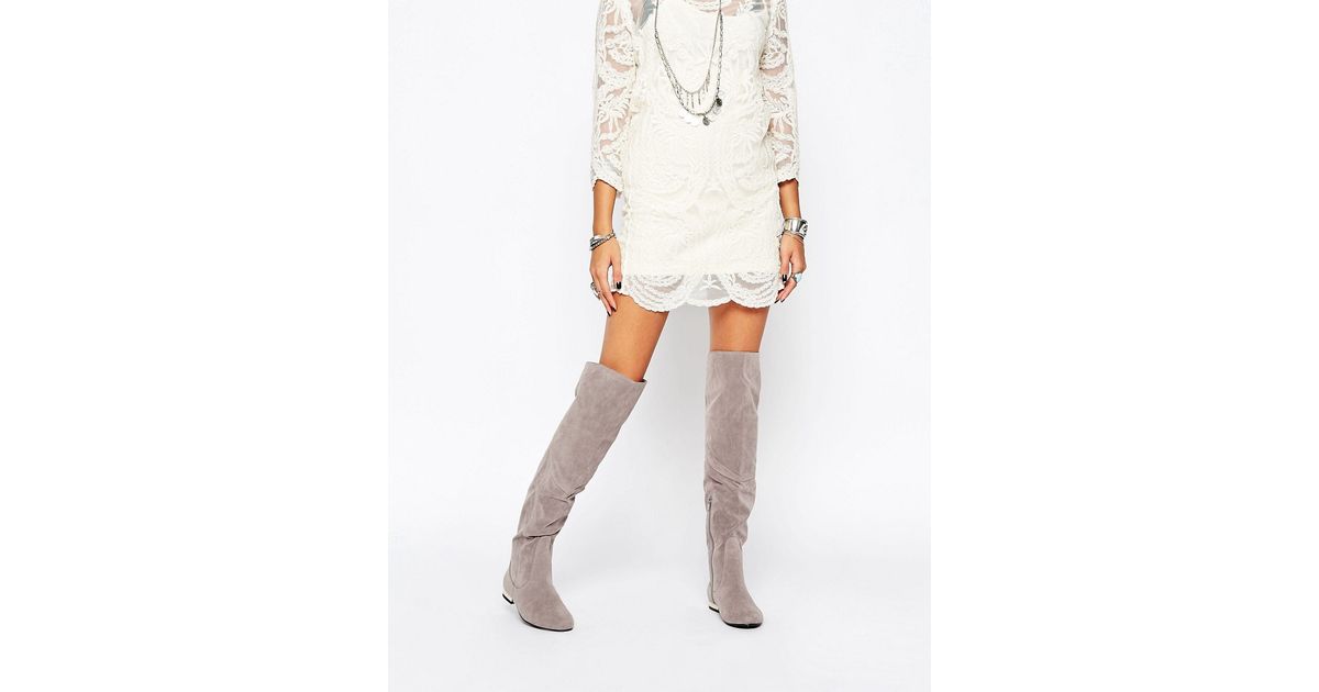 gray high knee boots