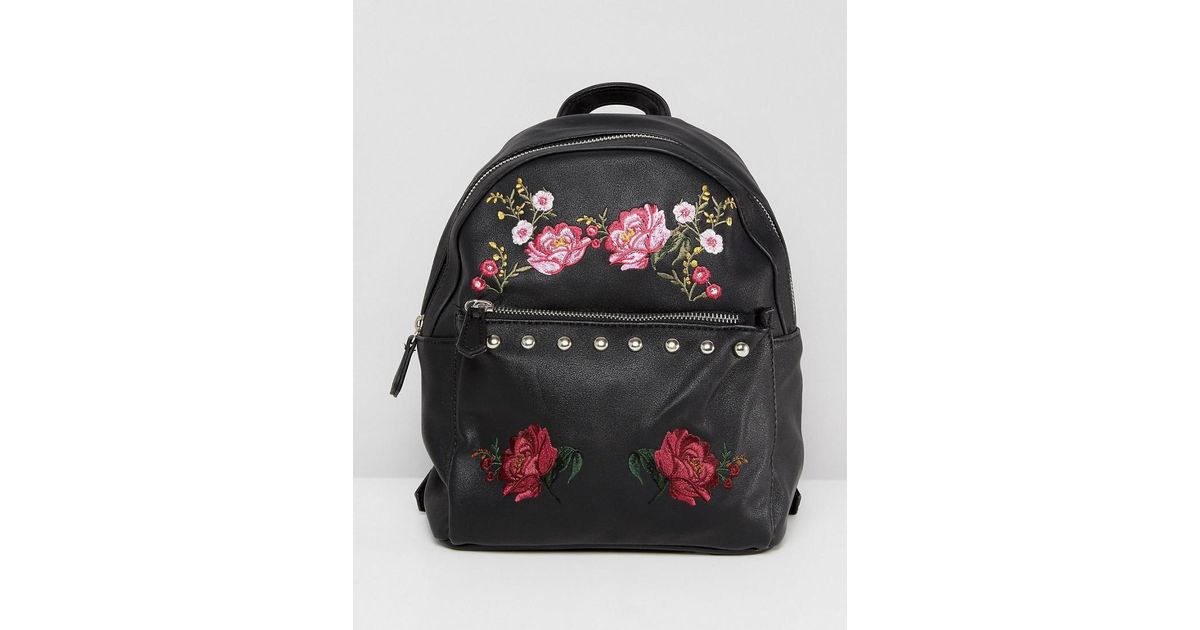 black embroidered backpack