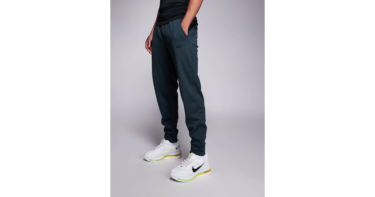 nike men's therma veneer tapered pants