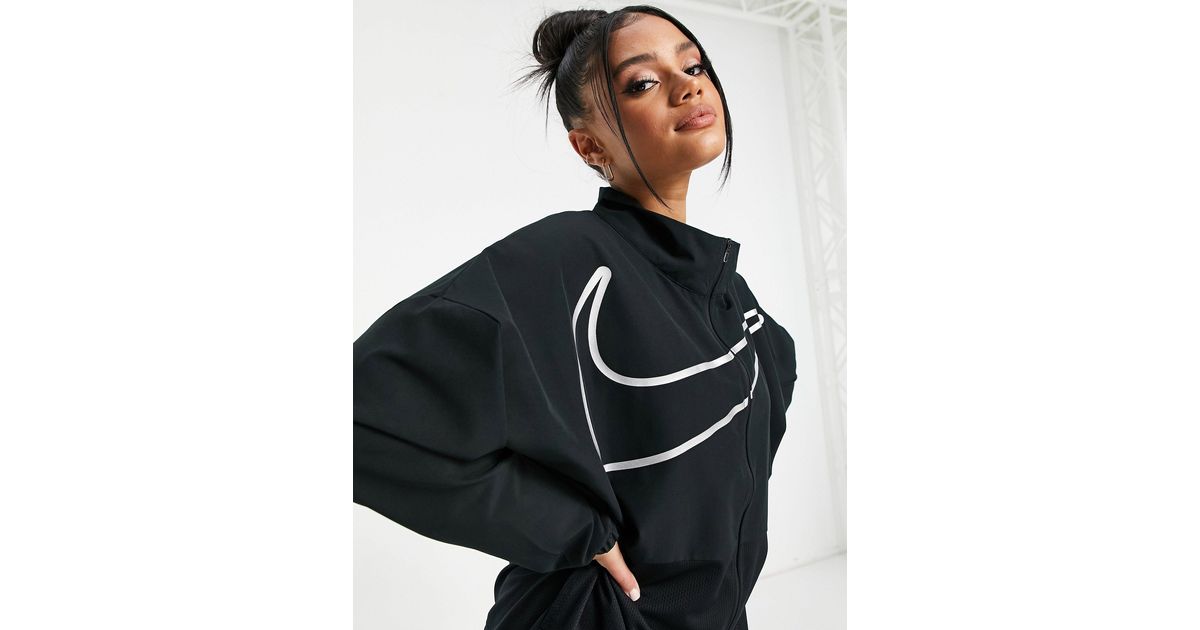 nike pro training zip jacket with large swoosh in black