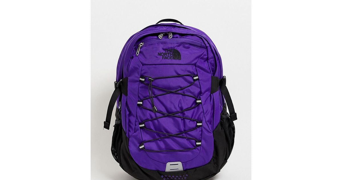purple north face bag