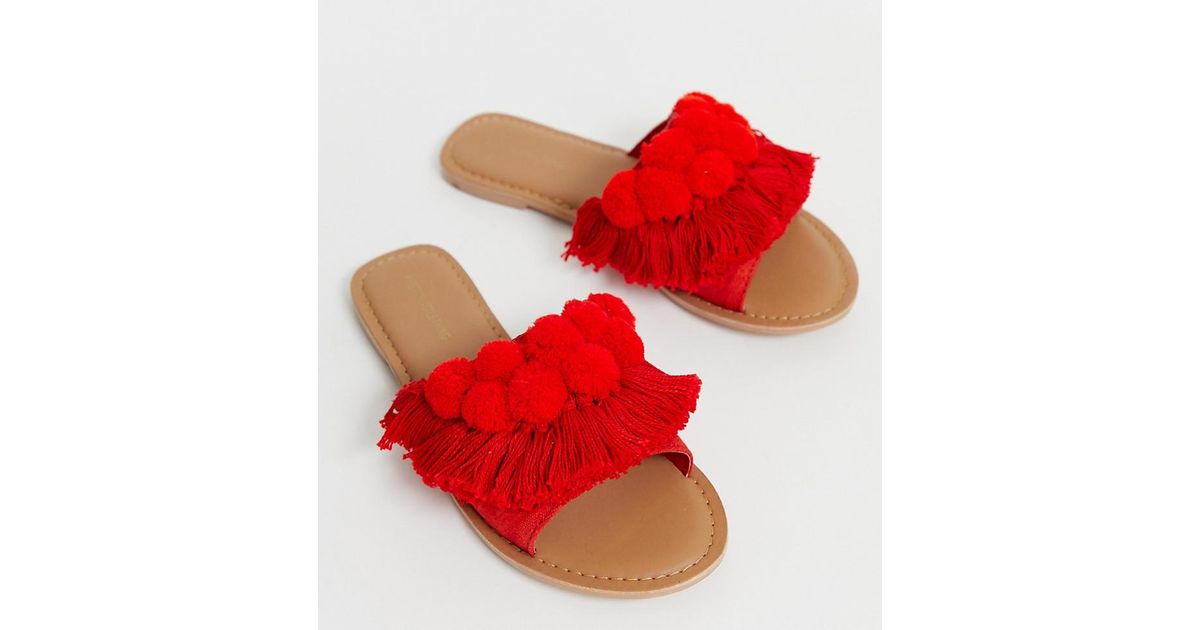 red pom pom slippers