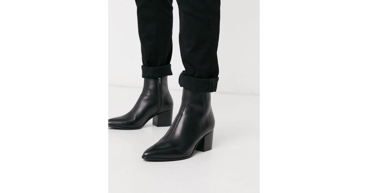 pointed black chelsea boots