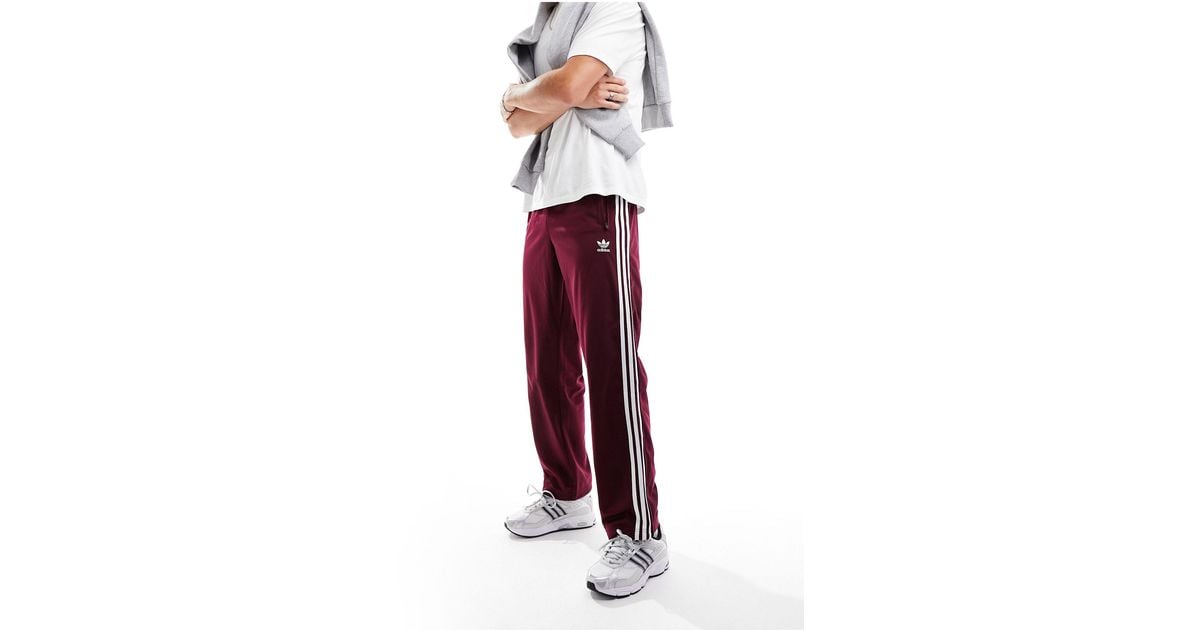 Adicolor pantaloni sportivi bordeaux da Uomo di adidas Originals in Rosso Lyst
