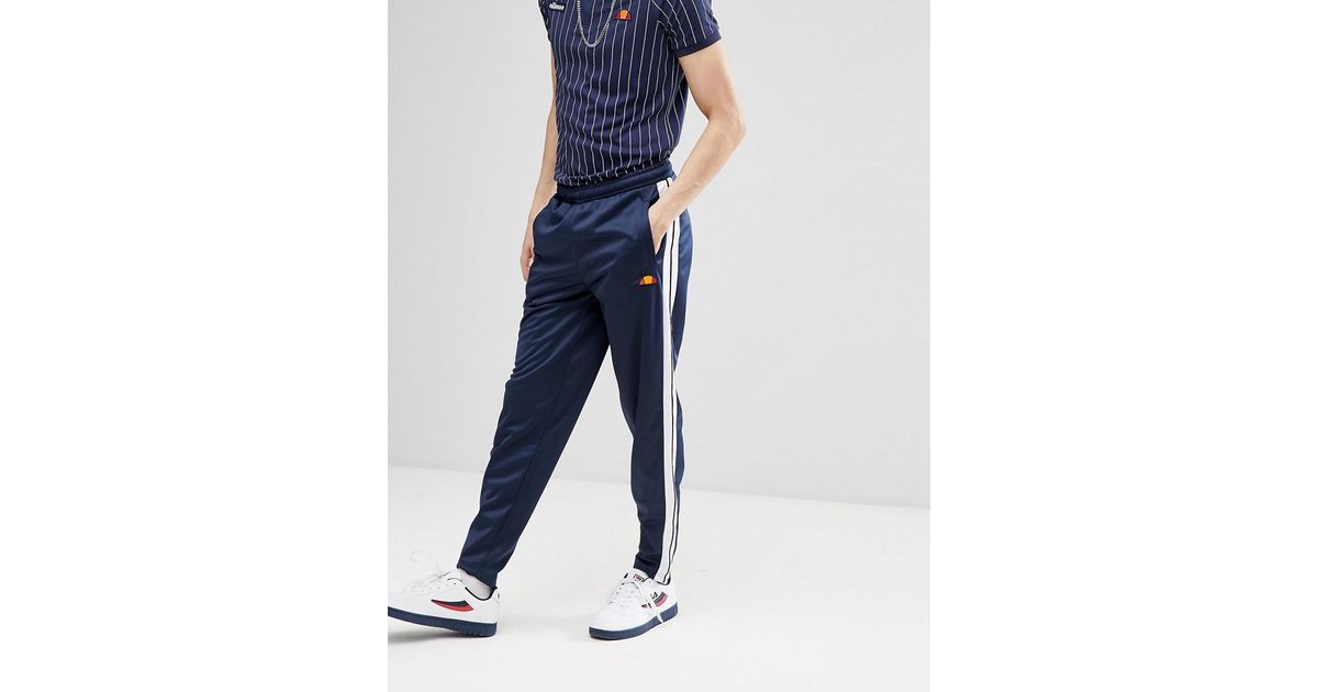 Pantalon de jogging en maille polyester avec bande Ellesse pour homme en  coloris Bleu - Lyst